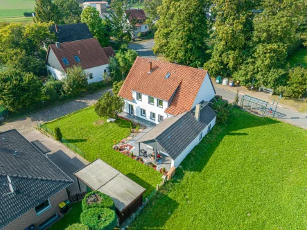 Luftaufnahme - Haus kaufen in Rinteln - Raumwunder! Modernisiertes EFH in Steinbergen!