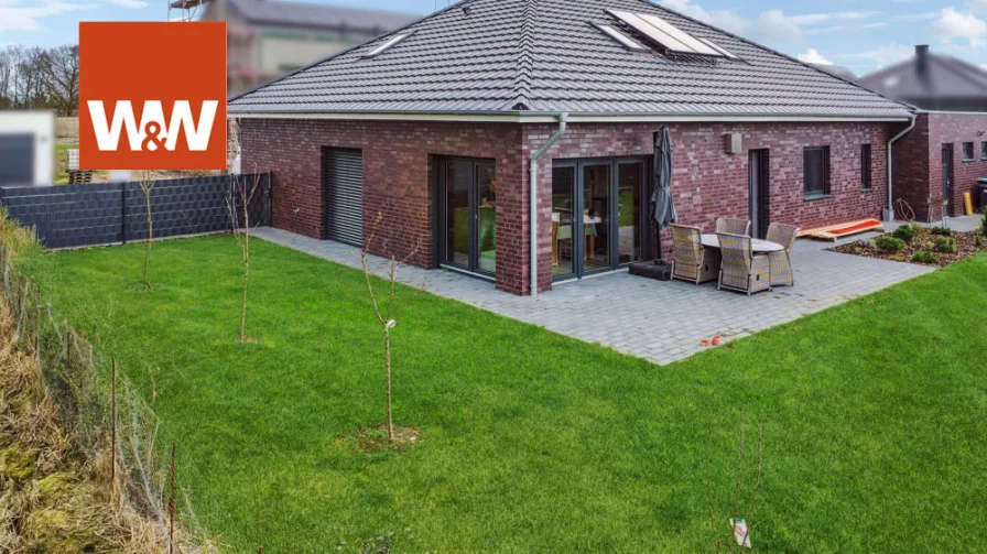 Gartenansicht - Haus kaufen in Beesten - Großzügiger Bungalow im Bieterverfahren