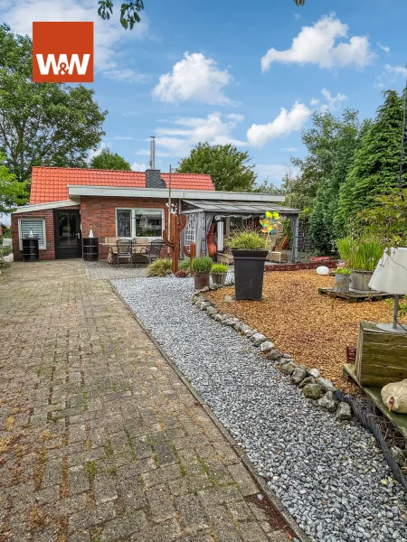 Strassenansicht - Haus kaufen in Bunde - Einfamilienhaus oder als Ferienhaus