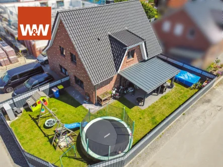 Titelbild - Haus kaufen in Dinklage - Familienfreundliches Einfamilienhaus in Dinklage