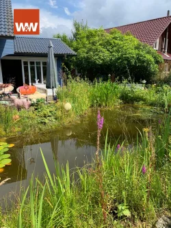 Schwimmteich - Haus kaufen in Walchum - Erholsames Wohnen an der Ems