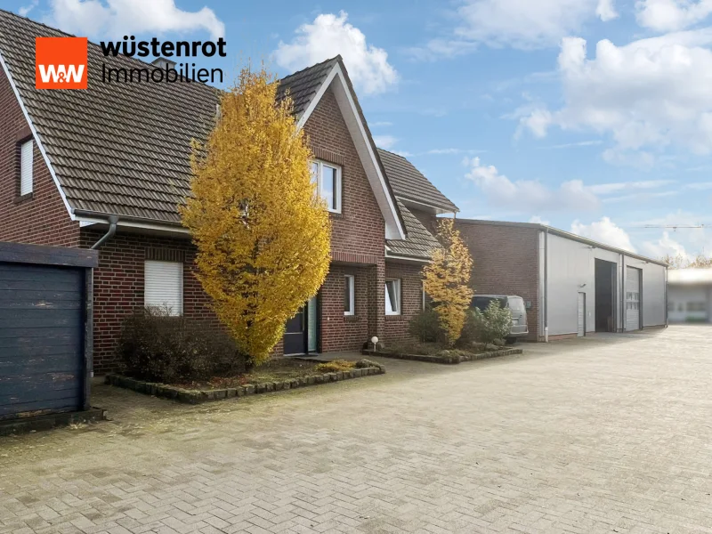 Vorder-Ansicht - Haus kaufen in Emsbüren - Willkommen in Ihrem neuen Zuhause – Einfamilienhaus inkl. Lagerhalle