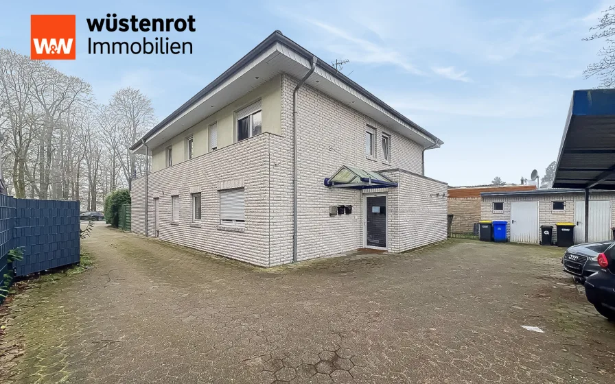 Vorderansicht - Wohnung kaufen in Gronau (Westfalen) - Helle Erdgeschosswohnung mit Terrasse, Garten und Stellplatz in Gronau (Westfalen)