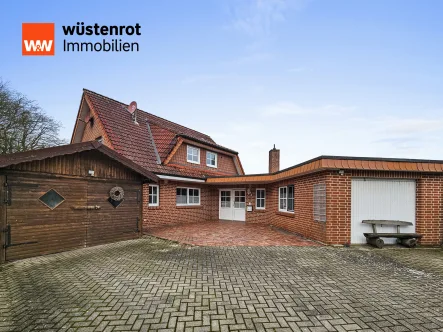 Titelbild - Haus kaufen in Bippen - Gemütliches Einfamilienhaus in Bippen