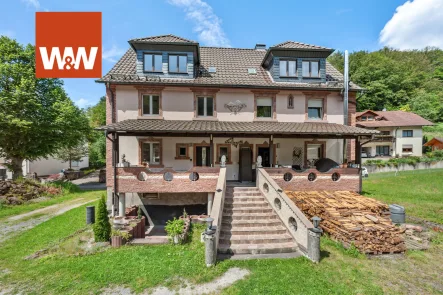 Außenansicht Gartenseite - Haus kaufen in Leidersbach - Zwei charmante Doppelhaushälften auf großem Grundstück