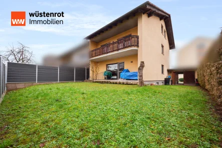 Ansicht aus dem Garten - Haus kaufen in Erlenbach am Main - Traumhaftes Einfamilienhaus mit besonderer Architektur in guter Lage