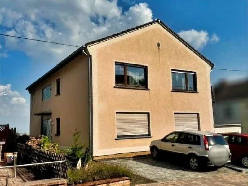  - Haus kaufen in Nickenich - Charmantes 3-Familienhaus in Hanglage mit großem Potenzial