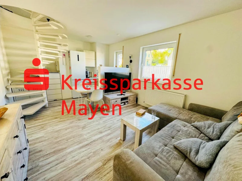 Küche und Wohnbereich - Wohnung kaufen in Andernach - Renovierte Maisonette-Eigentumswohnung mit Einbauküche und Stellplatz