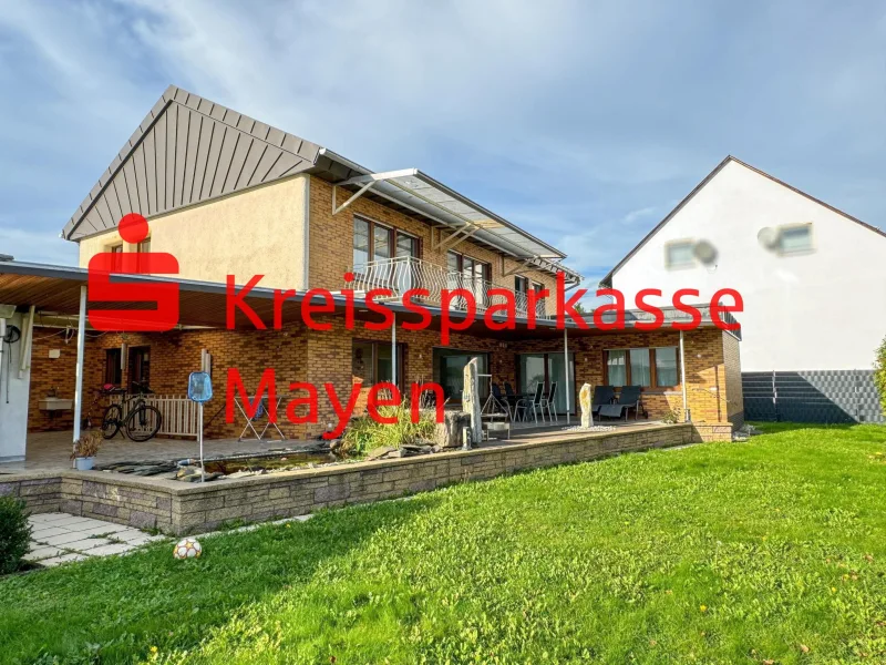 Terrasse - Haus kaufen in Neuwied - Exklusive Familienresidenz mit Einliegerwohnung und vielseitigem Potenzial 