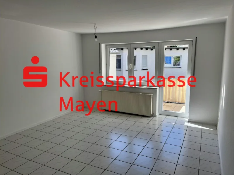 Wohnzimmer - Wohnung kaufen in Mayen - Attraktive 2-Zimmer-Eigentumswohnung mit Balkon 