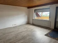 Wohnzimmer DG mit Blick zum Balkon