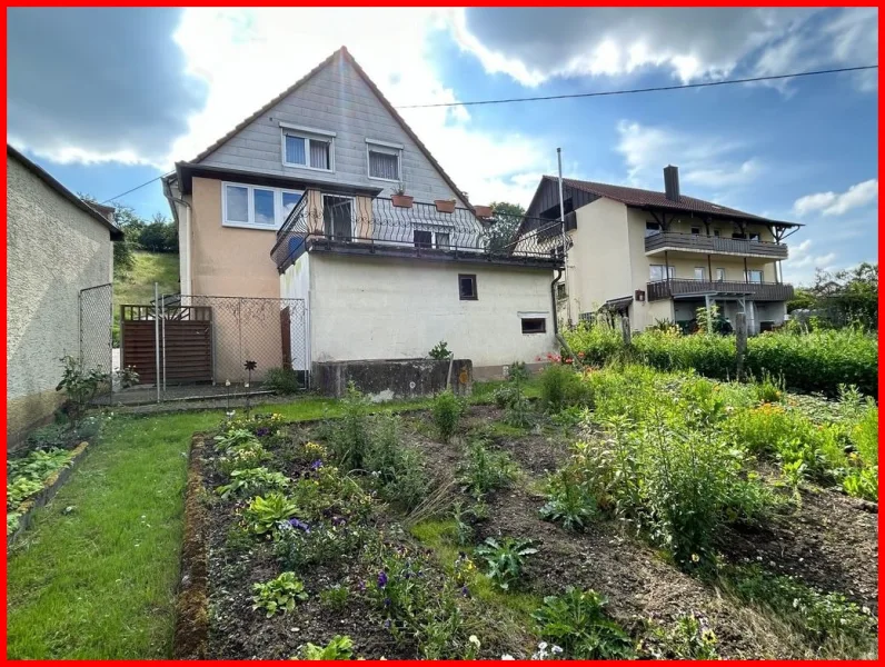 Rückansicht - Haus kaufen in Billigheim - ** Doppelhaushälfte mit sonniger Terrasse und Garten**