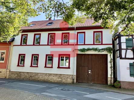  - Haus kaufen in Kleinkarlbach - Ehemaliges Winzeranwesen in Ortskernlage