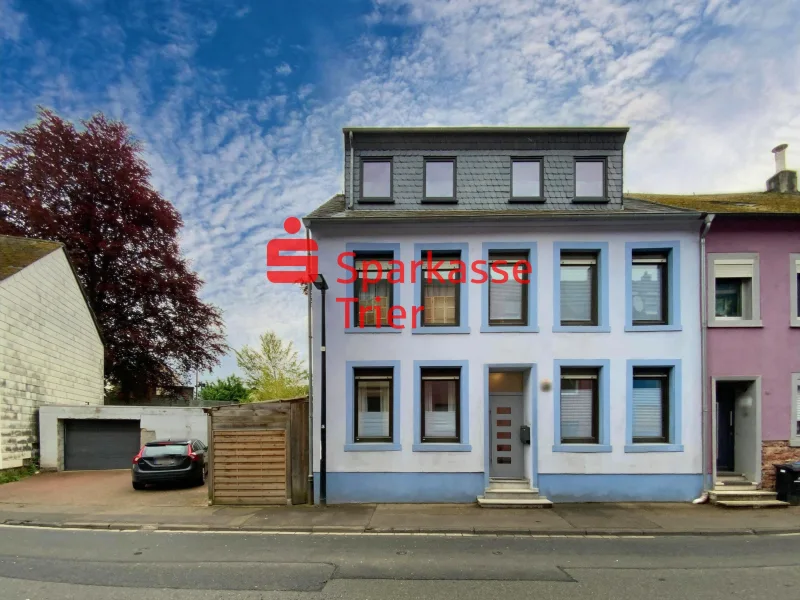 Außenansicht - Haus kaufen in Trier - Modern renoviertes Einfamilienhaus mit schönem Garten in Trier-Ehrang