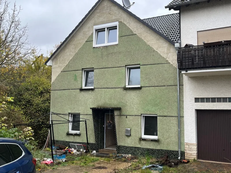 Hausansicht - Haus kaufen in Nittel - Zwangsversteigerung EFH in Nittel-Rehlingen, Verkehrswert 196.000 Euro