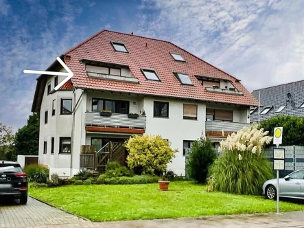 Aussenansicht - Wohnung kaufen in Lingenfeld - Charmante DG-Maissonette-Wohnung mit Loggia, Garten und Garage