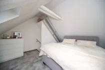 Schlafzimmer im Spitzboden