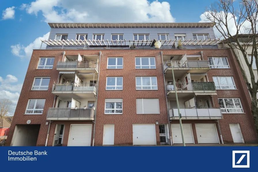 Außenansicht - Wohnung kaufen in Duisburg - Wohnen auf zwei Ebenen - mit Blick auf Wasser!