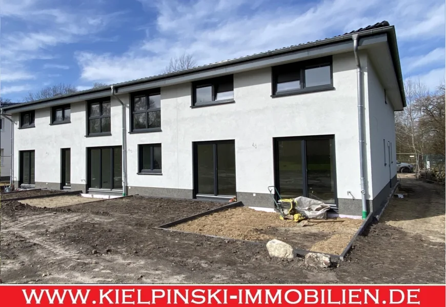 In Kürze fertig! - Wohnung kaufen in Hamburg - 3-Zi.-NEUBAU-ETW (KfW 55) im 1. OG mit Terrasse + eigenem Garten in Niendorf