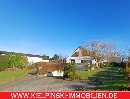 Herrliches Grundstück - Haus kaufen in Buchholz - Zwei Wohneinheiten in Dibbersenzwei Terrassen & Doppelgarage