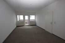 Wohnzimmer mit Balkon