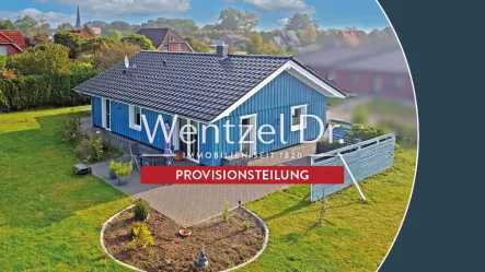 Titelbild - Haus kaufen in Oederquart - Neuwertiges Holzhaus - erweiterbar, mit modernster Technik und unverbautem Weitblick!