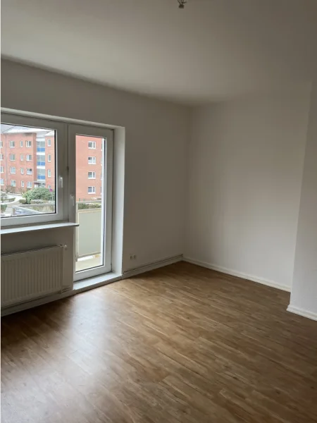 Wohnzimmer - Wohnung mieten in Ahrensburg - Moderne Singlewohnung mit Balkon in Ahrensburg 