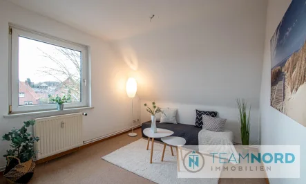 Wohnzimmer - Wohnung kaufen in Winsen (Luhe) - Ihre erste eigene Wohnung – gemütlich, zentral, perfekt!