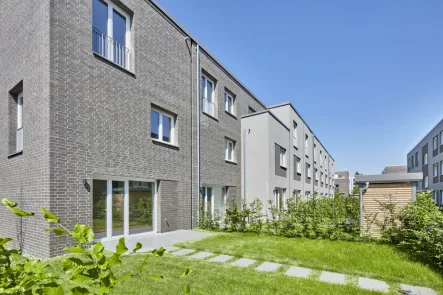 Rückansicht - Haus kaufen in Hannover - Frisch gebaut, frisch verliebt: Stadthaus für Stadtmenschen