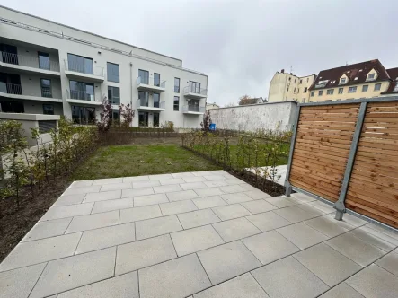 Terrasse - Wohnung mieten in Lübeck - Familienfreundliches Stadthaus in zentraler Lage auf verkehrsfreiem Grundstück