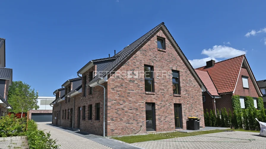Außenansicht - Haus kaufen in Tornesch - + Direkt einziehen - Mittelreihenhaus in Tornesch +
