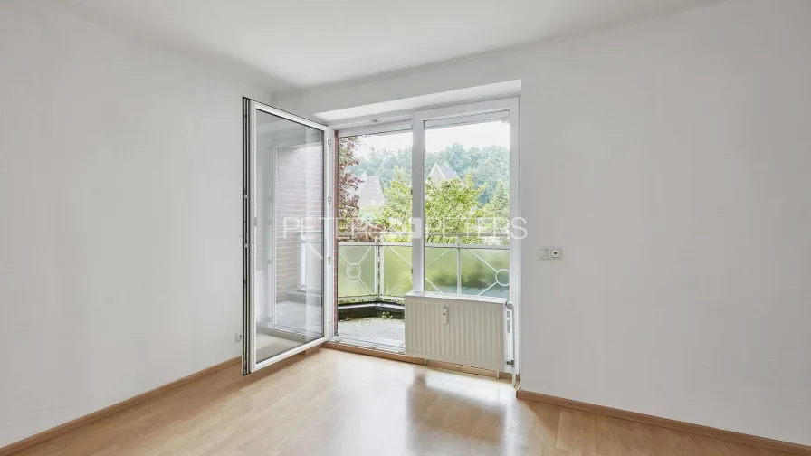 Wohnzimmer mit Ostbalkon