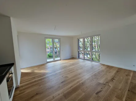 Wohnzimmer I - Wohnung mieten in Hamburg-Fuhlsbüttel - Neubau/Erstbezug in Fuhlsbüttel! - Moderne, kompakte 3-Zimmerwohnung mit 2 Balkonen