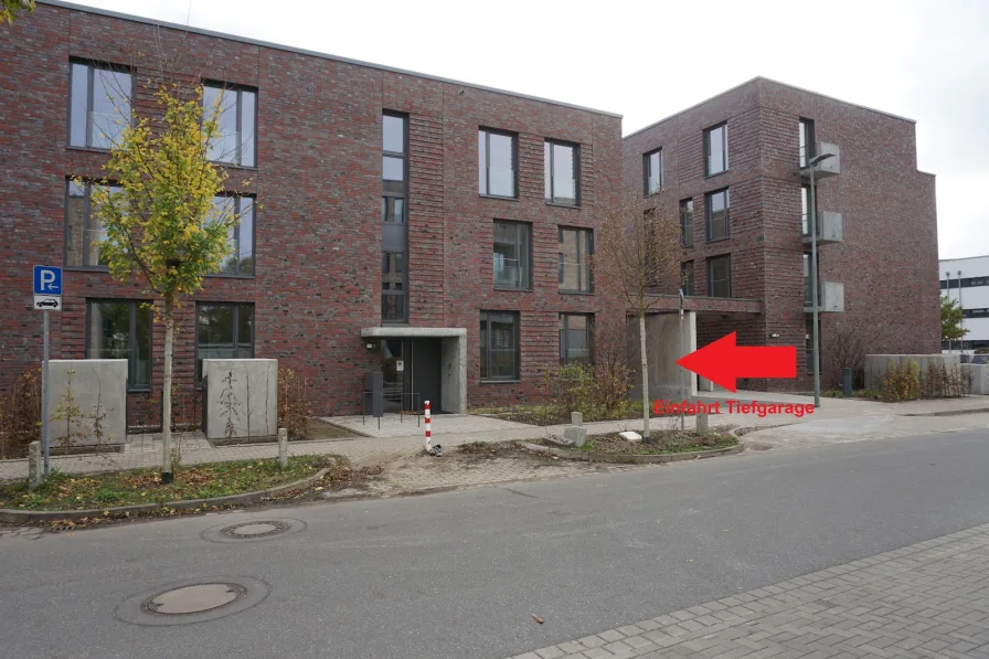 Objektbild (TG-Einfahrt) - Garage/Stellplatz mieten in Norderstedt - Tiefgaragenstellplatz auf Doppelparkanlage (Neubau) in Norderstedt (kurzfristig verfügbar!)