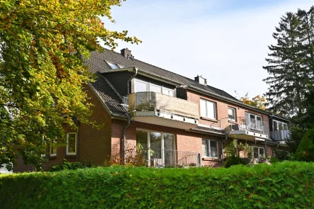 Außenansicht der Immobilie - Wohnung kaufen in Pinneberg - Zuverlässig vermietet: Attraktive ETW mit Süd-Balkon und PKW-Stellplatz im ruhigen Quellental