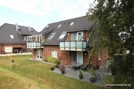 Rückansicht 2 - Wohnung mieten in Hamburg - Schicke 4-Zimmer-Erdgeschoss-Wohnung mit Terrasse und Gartenbereich