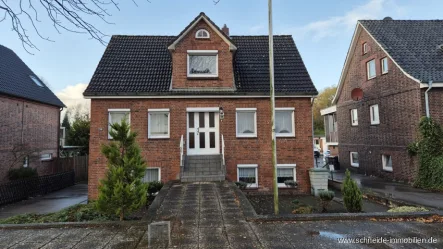 Titelbild - Haus kaufen in Hamburg - Sanierungsbedürftiges Einfamilienhaus mit großzügigen Nebengebäuden und Garten in Hamburg-Ochsenwerder