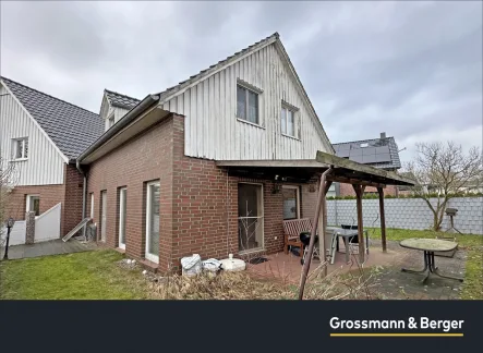 Rückansicht - Haus kaufen in Ellerbek - Doppelhaushälfte in rückwärtiger Lage