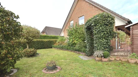 EG Garten - Haus kaufen in Schillsdorf - 2 vermietete Doppelhäuser mit glücklichen Mietern