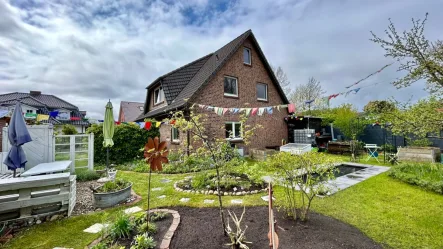 Gartenansicht - Haus kaufen in Neumünster - Junges Einfamilienhaus in beliebter Lage!