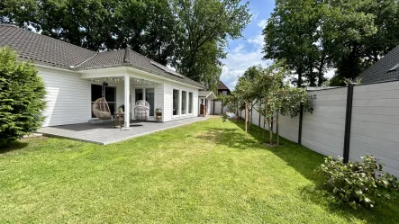 Titel - Haus kaufen in Lentföhrden - Komfort und Natur: Hochwertig sanierter Bungalow