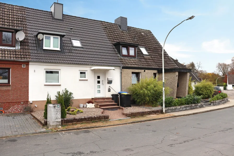 Titelbild - Haus kaufen in Ratekau-Sereetz - Bodenständiges Mittelreihenhaus mit Garten