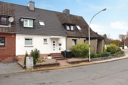 Titelbild - Haus kaufen in Ratekau-Sereetz - Bodenständiges Mittelreihenhaus mit Garten