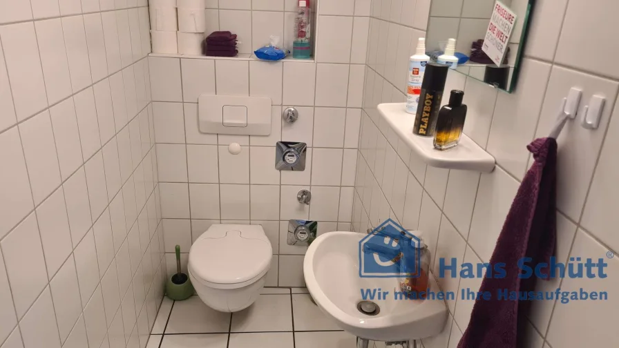 WC -Raum mit Handwaschbecken 