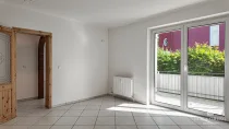 Schlafzimmer mit Zugang zum Balkon