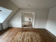 Wohnzimmer mit Holzdielen