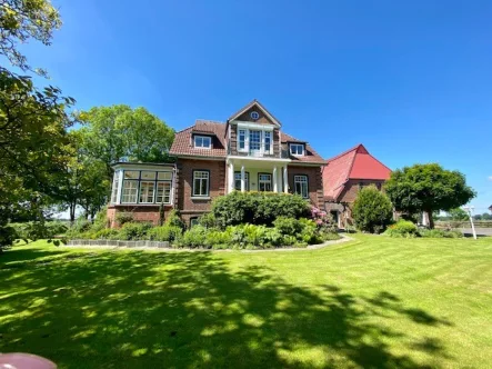 Gartenansicht - Haus kaufen in Ecklak - Schönes Ensemble mit Villa und 2 Scheunen in Ecklak- Otto Stöben Immobilien