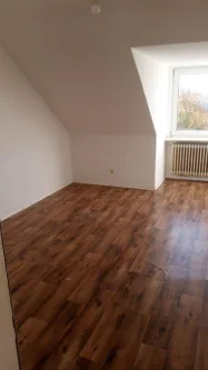 Wohnzimmer - Wohnung mieten in Eutin - 2-ZW in der Elisabethstr. 52a in Eutin zu vermieten! OTTO STÖBEN GmbH