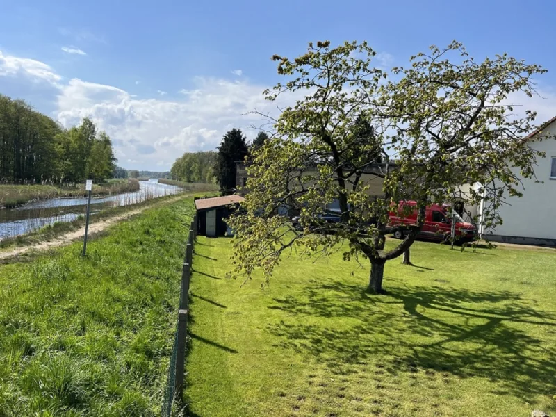 Grundstück mit Zarow - Haus kaufen in Grambin - Einfamilienhaus am Wasser