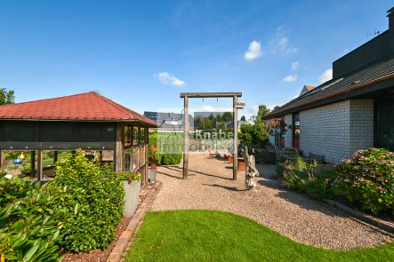 Viel Freiraum in beliebter Citylage! - Haus kaufen in Melle - Separates Baugrundstück on top! Hier wohnen Sie in bester Citylage!